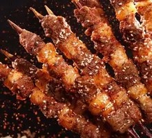 Charcoal-Grilled Lamb on Red Willow Branches