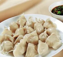 Handmade Scallion Pork Dumplings in Large Plate