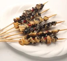 Charcoal-Grilled Snail Skewers