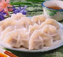 Handmade Cabbage and Pork Dumplings in Large Bowl
