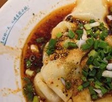 Sour Spicy Braised Dumplings