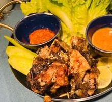 Pu'er Charcoal-Grilled Black Chicken