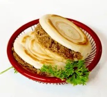 Lean Pork in Sauce with Flatbread