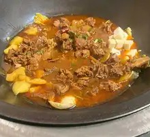 Stewed Pork Ribs and Goose in Iron Pot