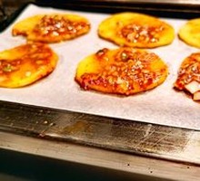 Grilled Potato Slices on Iron Plate