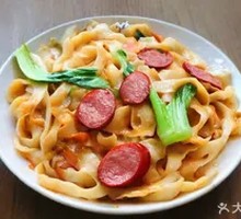 Stir-Fried Greens with Knife-Sliced Noodles