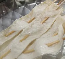 Oil-soaked tofu skin