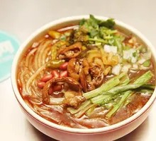 Sweet Potato Noodles with Pork Intestines and Spicy Sour Sauce