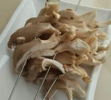 Fried Cold Noodles with Golden Needle Mushrooms, Pickled Radish, and Oyster Mushrooms