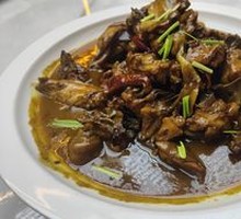 Stewed Rooster in Iron Pot