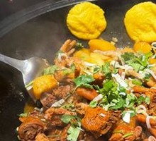 Stewed Pork Ribs and Chicken in Iron Pot