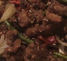 Stir-fried garlic shoots with pork