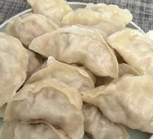Sour Cabbage and Pork Steamed Dumplings