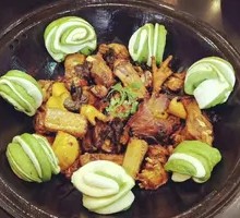 Stewed Pork Ribs and Chicken in Iron Pot