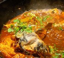 Stewed Bighead Carp in Iron Pot