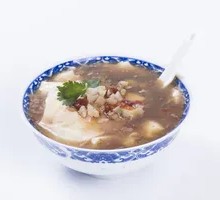 Tofu pudding with spicy soup mixed