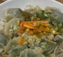 Fresh Chive and Pork Dumplings with Garlic Dressing