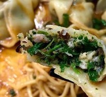 Peanut Sauce Tossed Mustard Greens Dumplings
