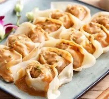 Shiitake Shrimp Dumplings with Peanut Sauce