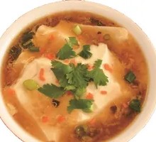 Tofu pudding with spicy soup mixed