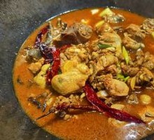 Stewed Rooster in Iron Pot