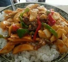 Stir-fried Beef with Chicken Leg Mushrooms over Rice