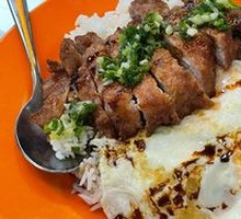 Signature Pork Chop with Two Eggs Fried Rice