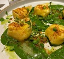 Grilled Italian Ravioli with Parmesan and Tomato Seeds