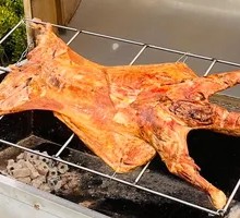 Whole Lamb Roasted Over Charcoal