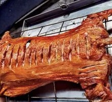 Whole Lamb Roasted Over Charcoal