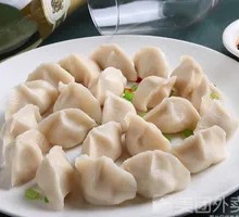 Pork and Scallion Sour Soup Dumplings