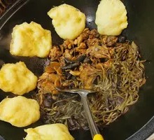 Stewed Pork Ribs and Chicken in Iron Pot