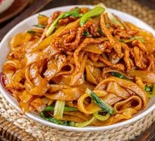 Stir-Fried Rice Noodles with Pork and Greens