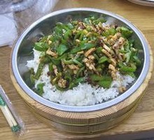 Green Pepper and Pork Stir-fry in Wooden Bucket Rice