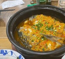 Golden Fish Head in Clay Pot