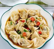 Peanut Sauce Tossed Dumplings
