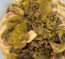 Stir-fried Beef with Pickled Cabbage and Satay Sauce Served with Crispy Noodles