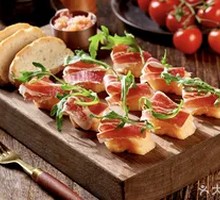 Iberian Acorn Ham with Melon and Arugula