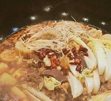 Stir-Fried Rooster in Iron Pot