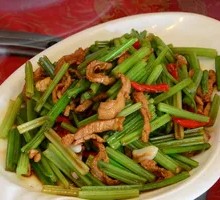 Celery Stir-Fried with Pork and Rice in a Wooden Bucket