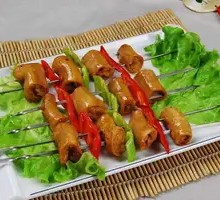 Charcoal-grilled Intestine Rolls with Scallion