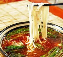 Sizzling Pork Belly Noodles in Clay Pot