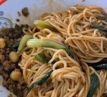 Signature Spicy Noodles with Peas and Pork