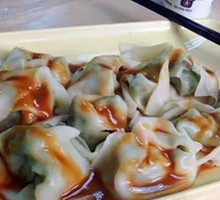 Sauce-Drizzled Dumplings