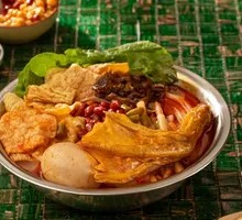 Spicy Snail Noodles with Duck Feet and Marinated Eggs