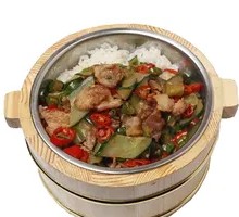 Green Pepper and Pork Stir-fry in Wooden Bucket Rice