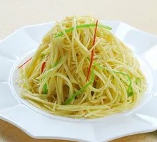 Sliced Potatoes with Green Pepper