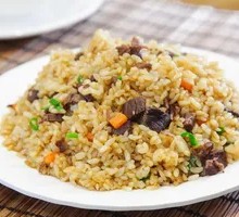 Stir-fried Beef with Garlic Shoots over Rice