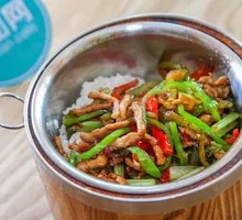 Green Pepper and Pork Stir-fry in Wooden Bucket Rice
