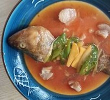 Sichuan-style Braised Sea Bass with Ginger, Scallions, Chili and Pork Lard Crumbs
